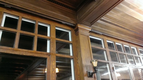 The coffered ceilings in the barber room.