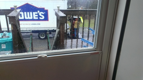 Delivery guys in the pouring rain