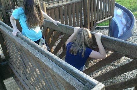 My girls on the playground bridge.